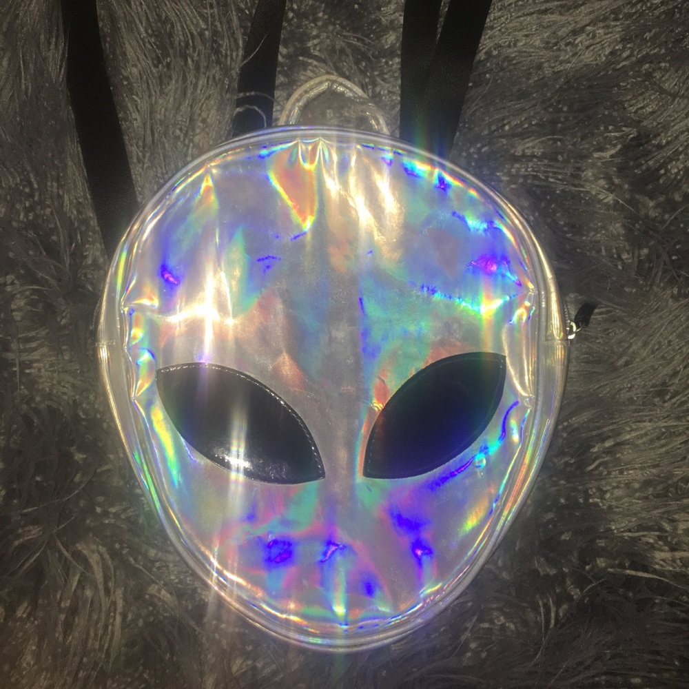 Metallic alien backpack almost perfect condition